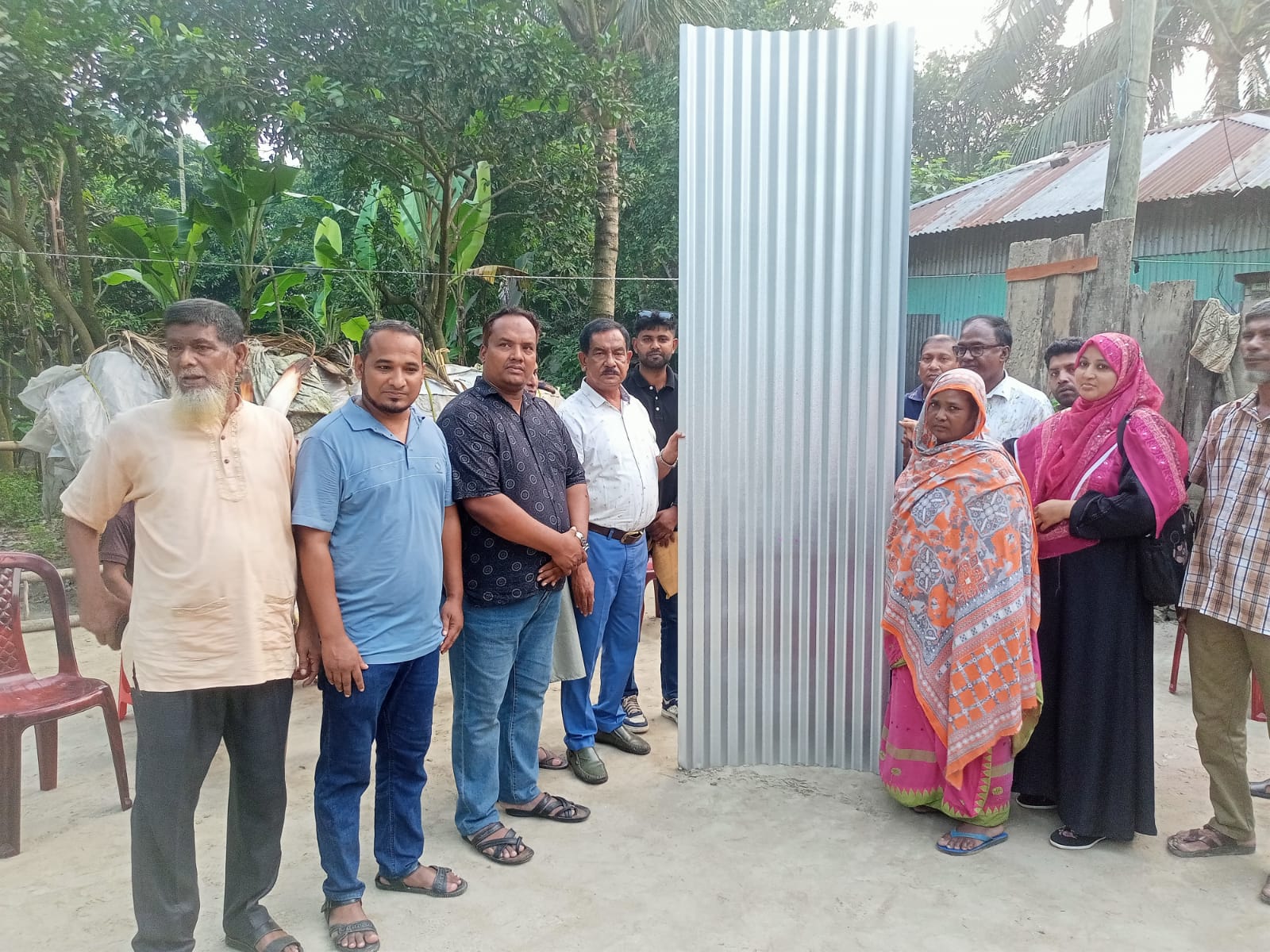 দুই অসহায় বিধবার পাশে বিকেএস, দেওয়া হলো ঢেউটিন ও নগদ টাকা